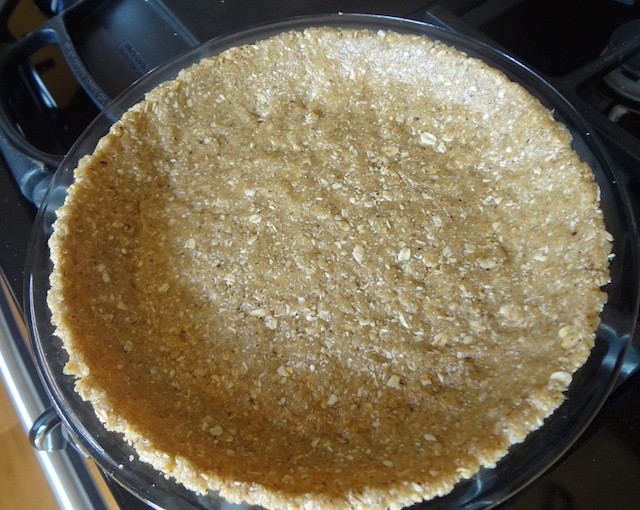 A gluten-free walnut-oat crust before baking.