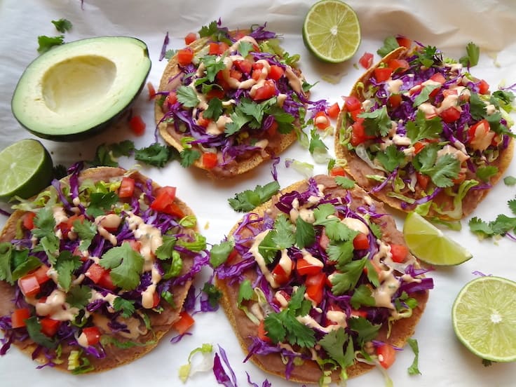 Mouth-watering, Quick 7 Layer Vegan Tostadas. So simple to prepare and ready in under 20 min... A go-to when I'm in the mood for a quick Mexican meal.