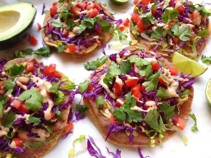 Mouth-watering, Quick 7 Layer Vegan Tostadas. So simple to prepare and ready in under 20 min... A go-to when I'm in the mood for a quick Mexican meal.