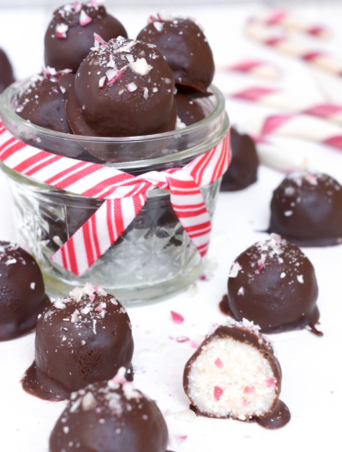 Peppermint Candy Cane Truffles are loaded with an irresistible candy cane crunch. They are a great allergy-friendly holiday treat or a perfect homemade gift. Vegan, gluten-free, nut-free and only 6 simple ingredients to make! You don't have to like the holidays to LOVE these truffles!