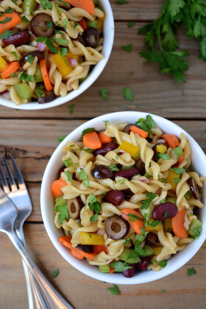A healthier, vegan Italian Pasta Salad prepared with a sweet and tangy, homemade balsamic vinaigrette. A "must have” for any summertime picnic or gathering. It’s quick, easy to make and ready in under 30 minutes! Plus, swapping out the noodles instantly makes this gluten-free!