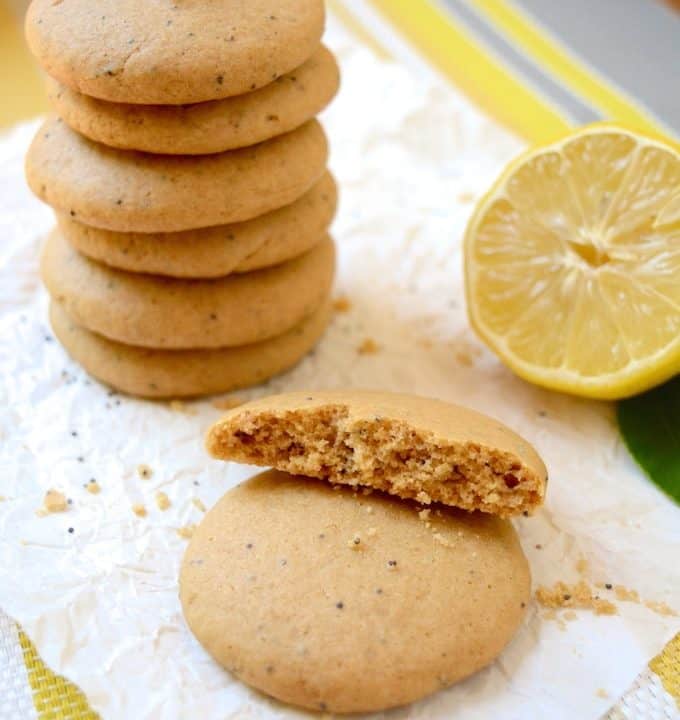 Soft, Vegan Lemon Poppy Seed Cookies, a simple recipe that's bursting with fresh lemon flavor. These melt-in-your-mouth cookies are free of egg, dairy and refined sugar –which makes them a healthier option! Flavored with fresh squeezed lemon juice, these soft and tender cookies are sure to be your new favorite treat!