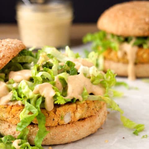 Chickpea Burgers with Spicy Cajun Sauce are vegan food obsession worthy! Serve with chips, or baked fries, on the side for the perfect weeknight dinner!