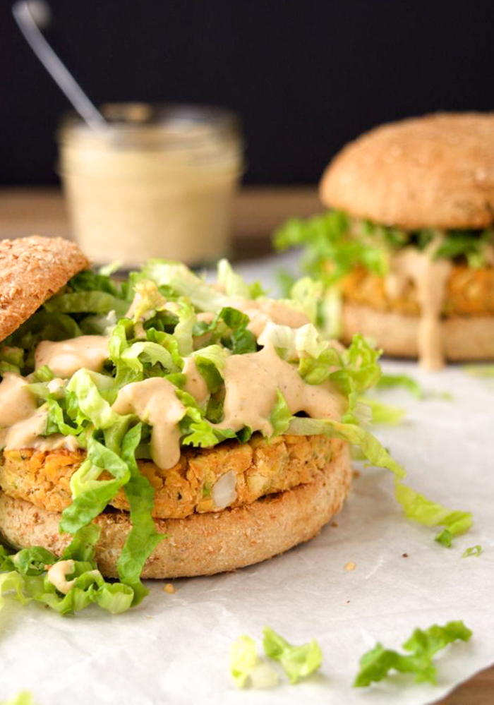 Chickpea Burgers with Spicy Cajun Sauce are vegan food obsession worthy! The chickpea patties are kid friendly. The sauce, however, may not be! But that won’t stop you from slathering this spicy cajun sauce on every bite! Serve with a side of chips, or baked fries, for the perfect weeknight dinner! (gluten-free option)