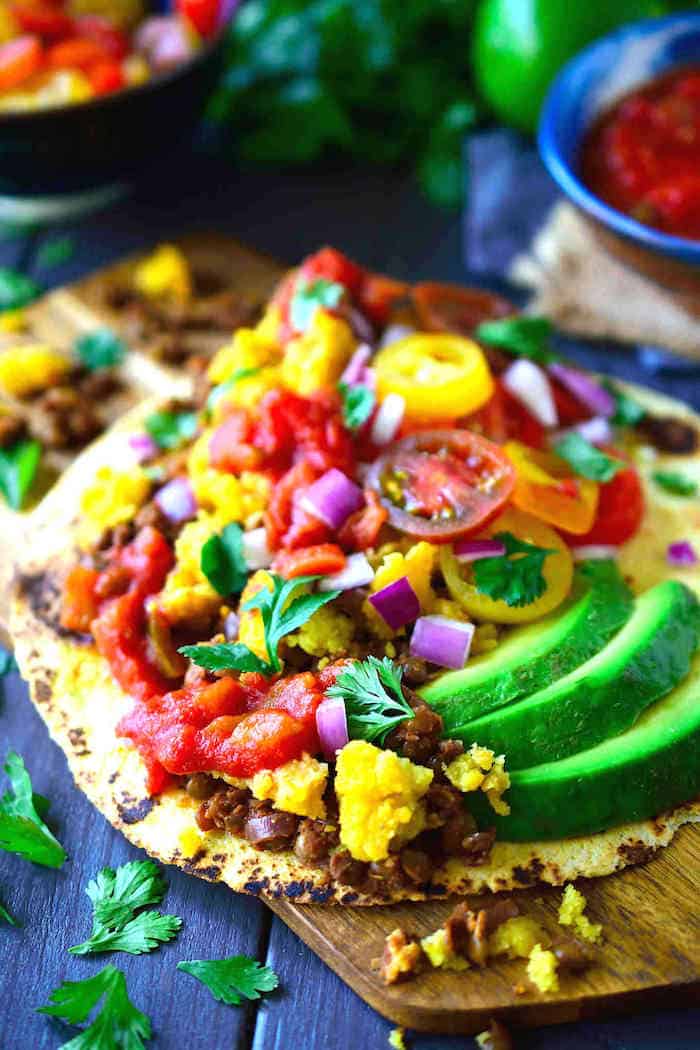 36 Vegan Mexican Recipes! Loaded breakfast tacos, Hearty mains, Spicy sides and more! Recipes include burritos, tacos, enchiladas, dips etc!