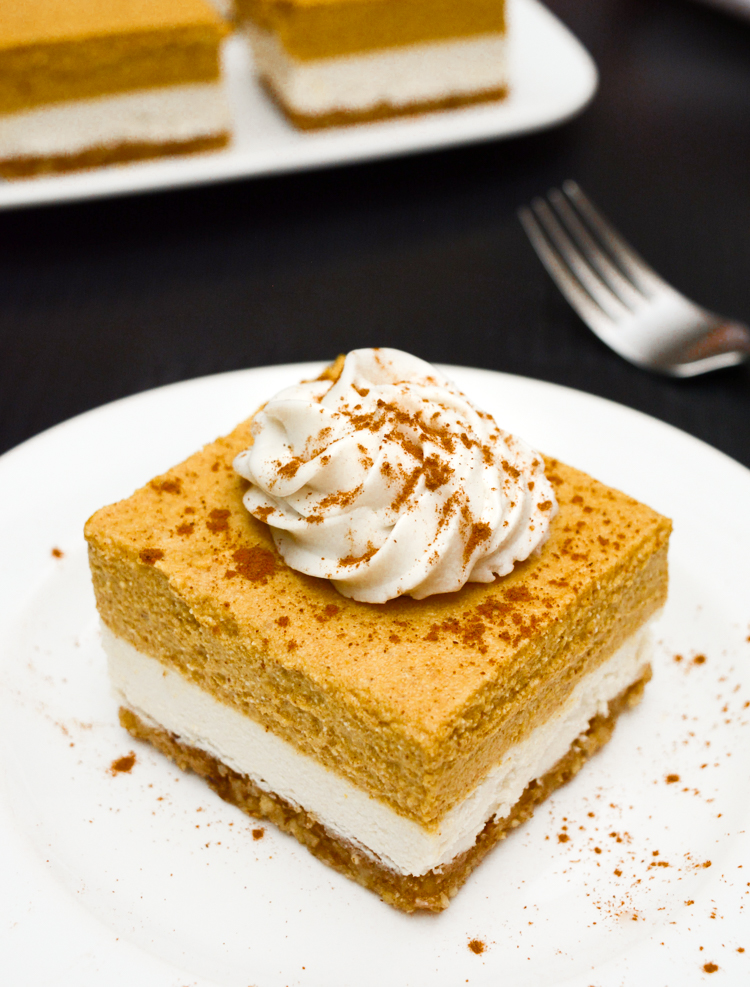 Vegan Pumpkin Cheesecake Bars are an easy, no-bake Fall recipe! The walnut crust pairs perfectly with the classic cheesecake and spiced pumpkin layers. Top the bars with coconut whip for a decedent Fall dessert. gluten-free, no refined sugar and no added oil!