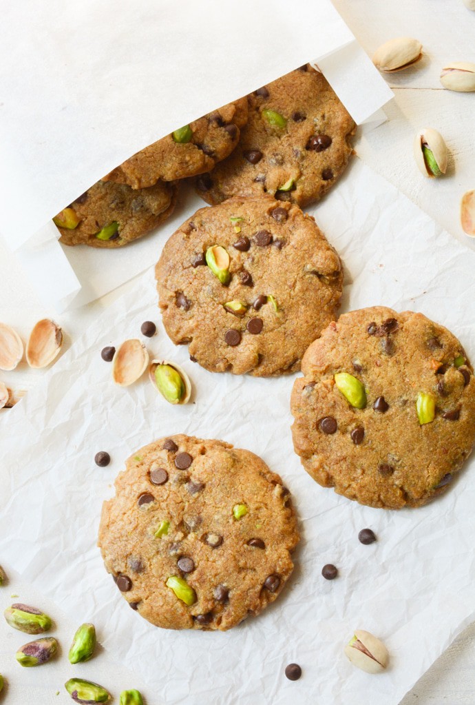 Vegan Pistachio Chocolate Chip Cookies are loaded with salty pistachios and mini chocolate chips. The sweet/salty combo makes them an ideal baked treat! They’re egg-free, dairy-free and even refined-sugar-free!