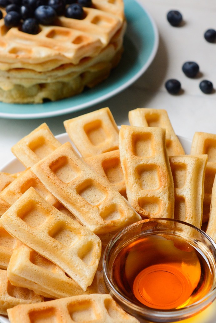 Vegan Vanilla Waffle sticks are a fun, dippable breakfast for kids and adults alike! A few special ingredients give these homemade waffle sticks an extra crispy outside while the center remains soft and fluffy. Keep the recipe classic and serve with maple syrup or go all out with a fancy fruit dip and coconut whipped cream!