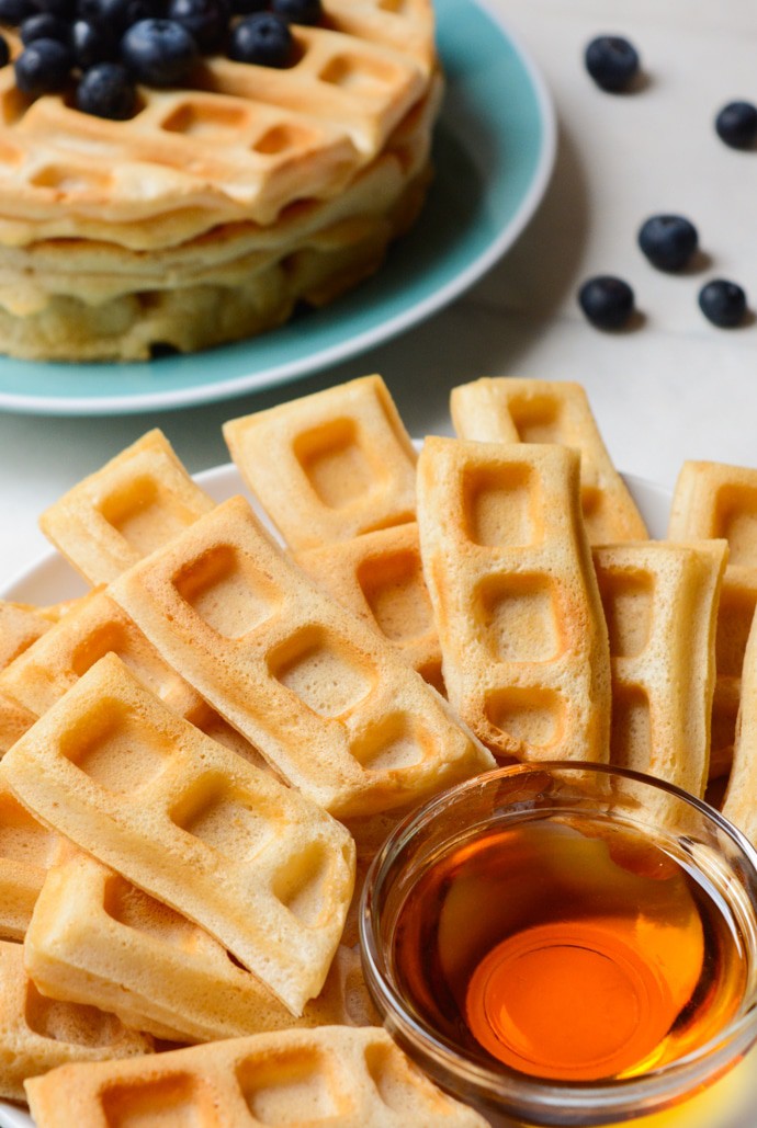 Vegan Vanilla Waffle sticks are a fun, dippable breakfast for kids and adults alike! A few special ingredients give these homemade waffle sticks an extra crispy outside while the center remains soft and fluffy. Keep the recipe classic and serve with maple syrup or go all out with a fancy fruit dip and coconut whipped cream! 