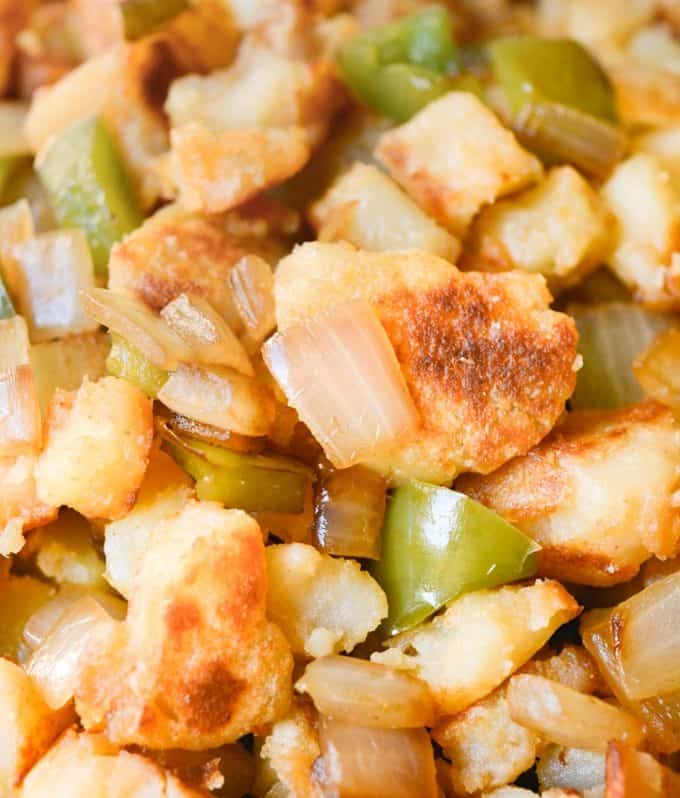 Close up of browned breakfast potatoes with onions and bell peppers.