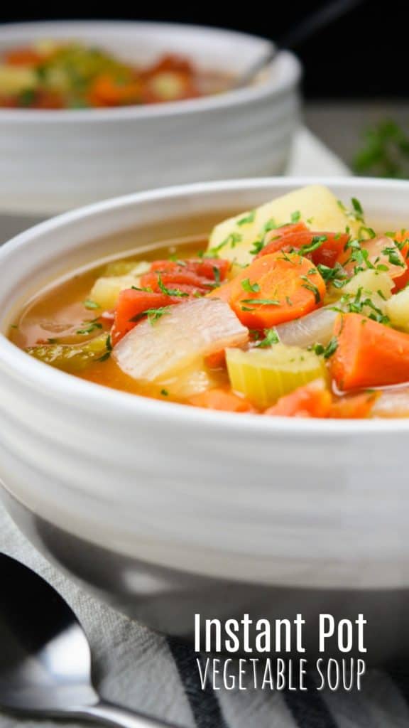 Instant Pot vegetable soup in a white bowl.