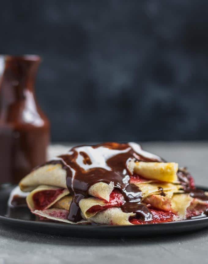 Vegan Crepes with strawberries and chocolate sauce