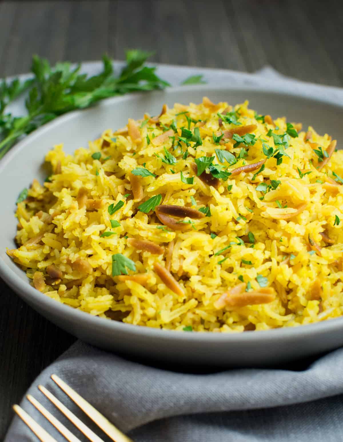 A serving plate with rice pilaf.