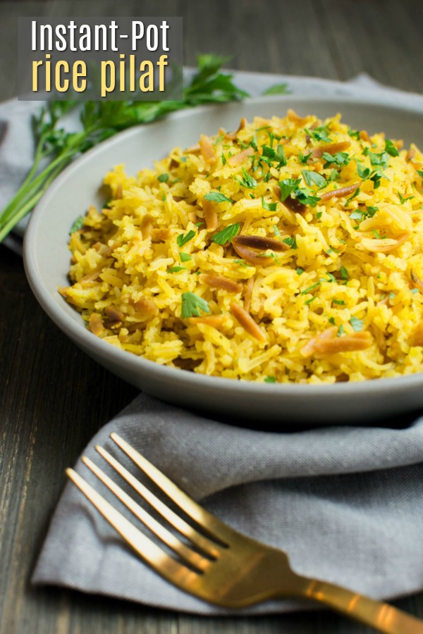 Plated Instant-Pot rice pilaf with a fork.