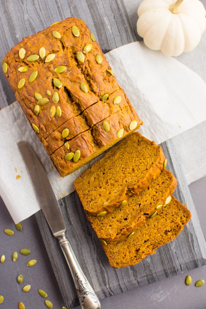 Vegan Pumpkin Banana bread topped with pumpkin seeds.