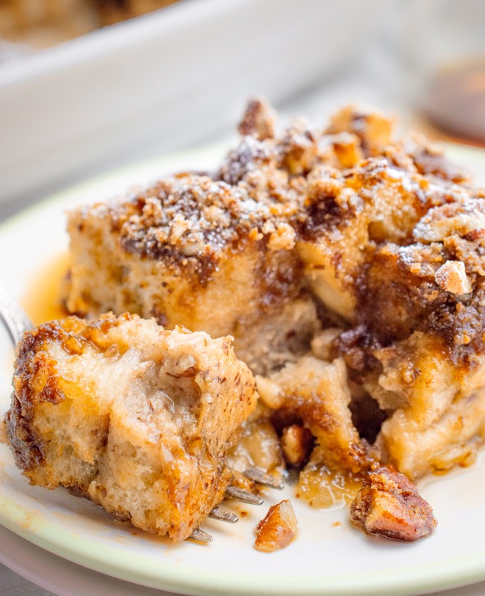 A bite of vegan french toast casserole on a fork.