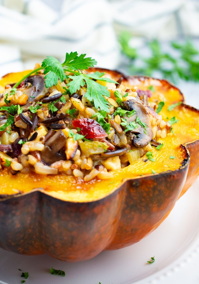 Roasted acorn squash stuffed with wild rice and mushrooms.