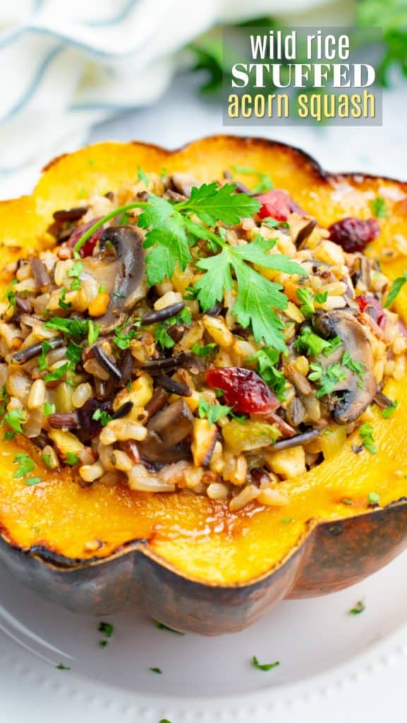 Wild rice stuffed acorn squash with text for Pinterest.