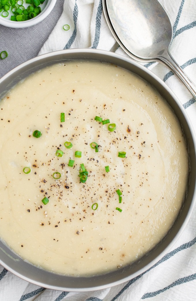 Potato soup in a gray bowl.