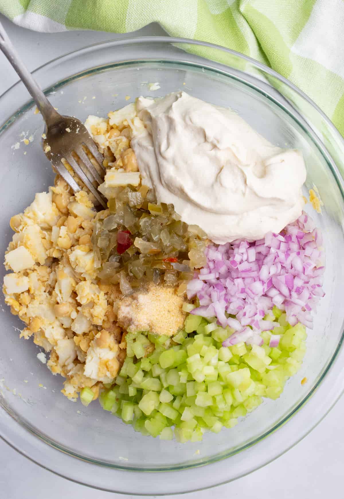 A bowl of vegan tuna salad ingredients.