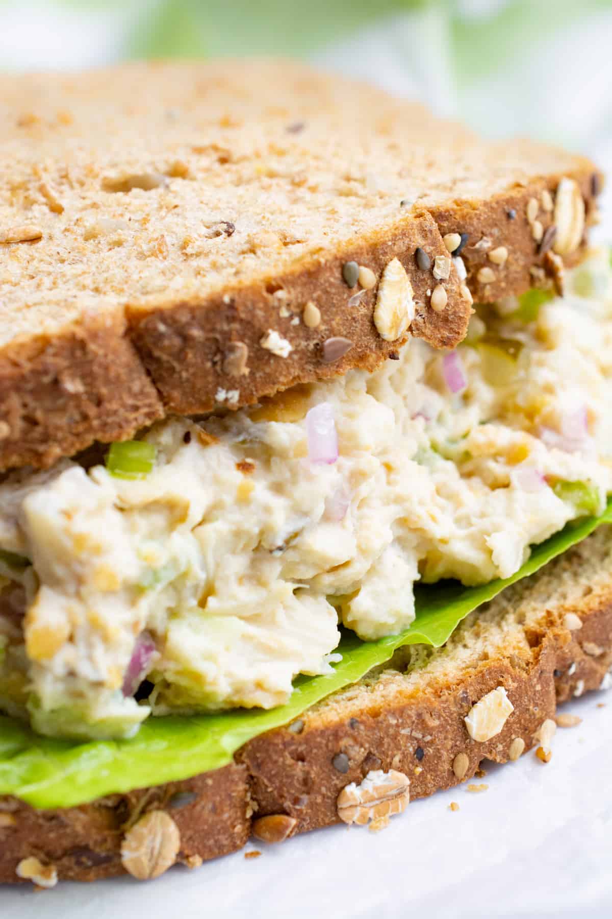 Vegan tuna salad sandwich on wheat bread.