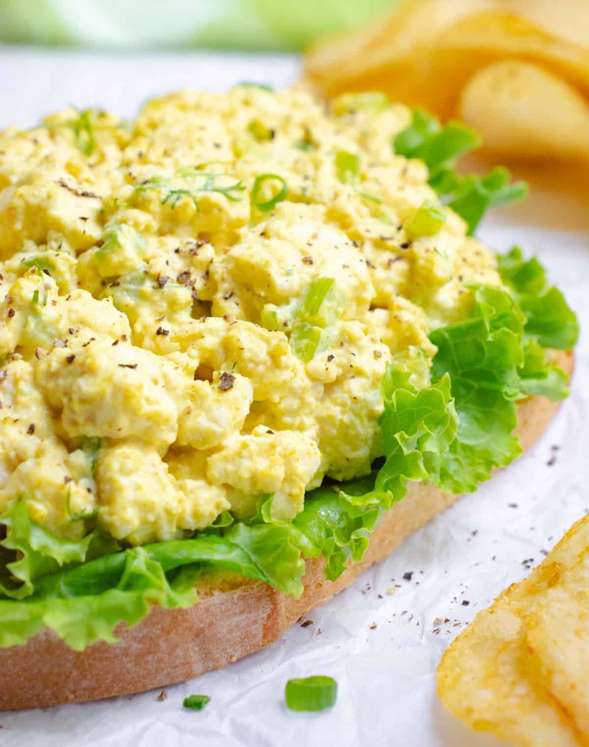 Open face egg salad sandwich.