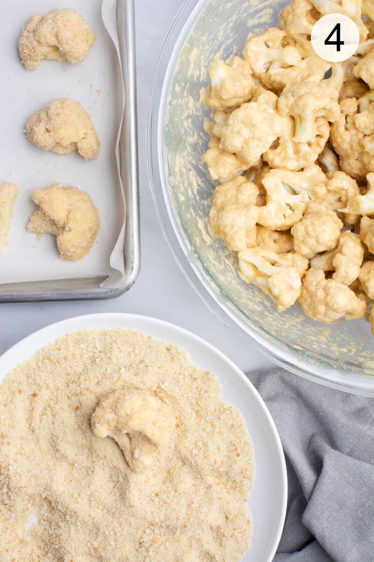 Showing three stages of breading cauliflower wings: In a bowl battered, tossed in breadcrumbs, and on a baking sheet.