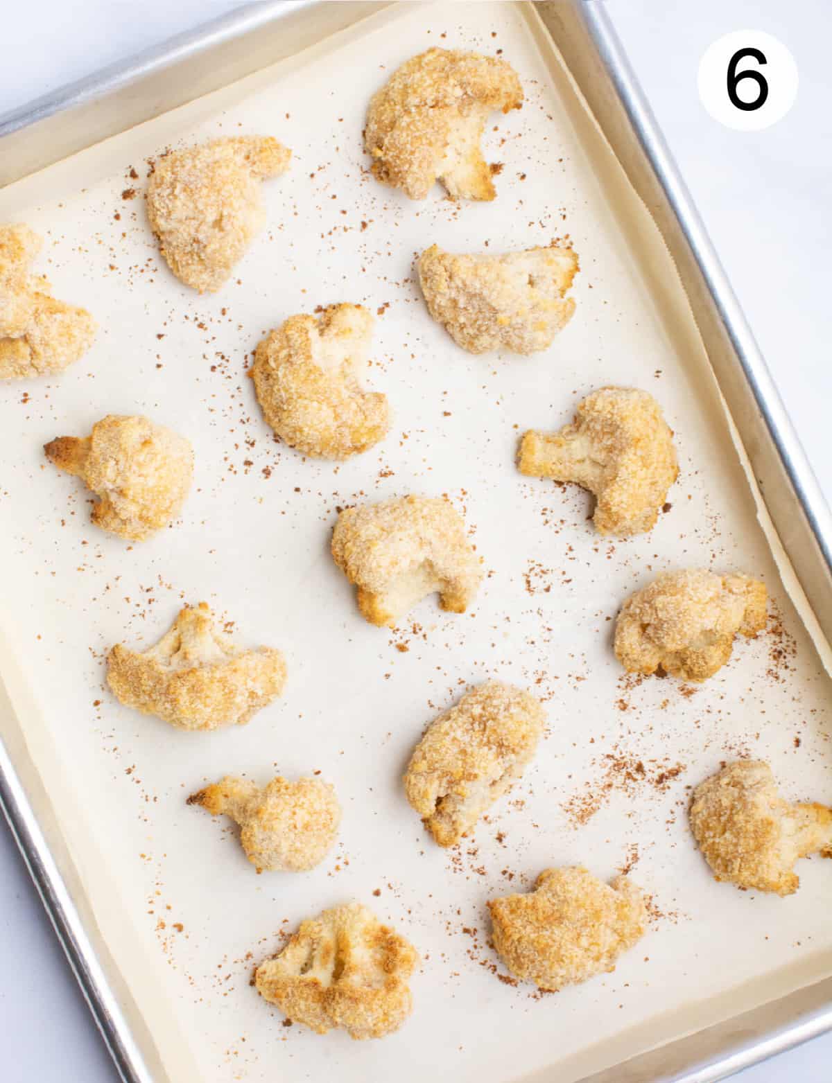 A pan of breaded cauliflower after baking. 
