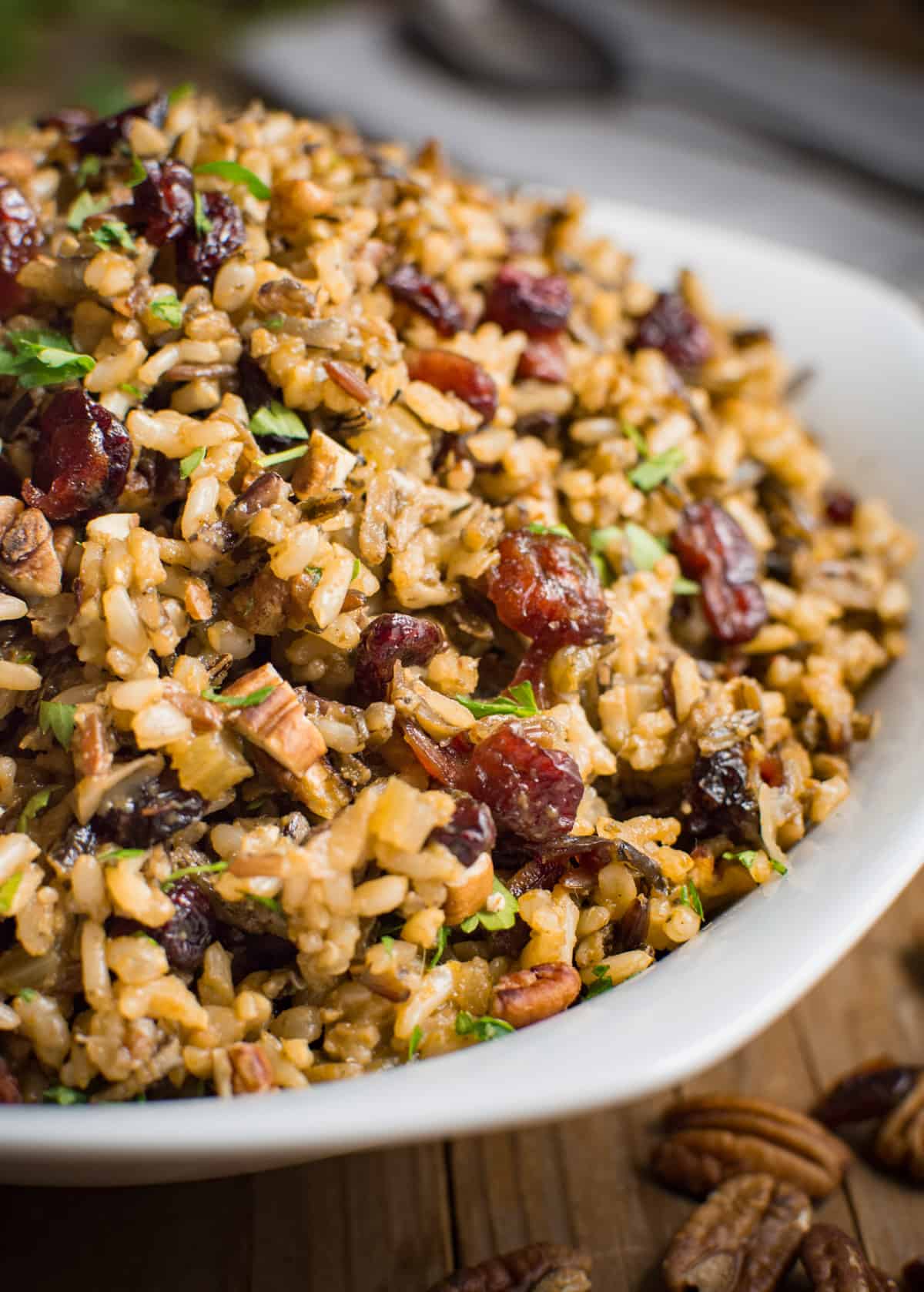 Close up of gluten-free wild rice stuffing with cranberries and pecans.