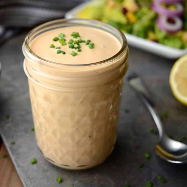 A jar of vegan bbq ranch dressing.