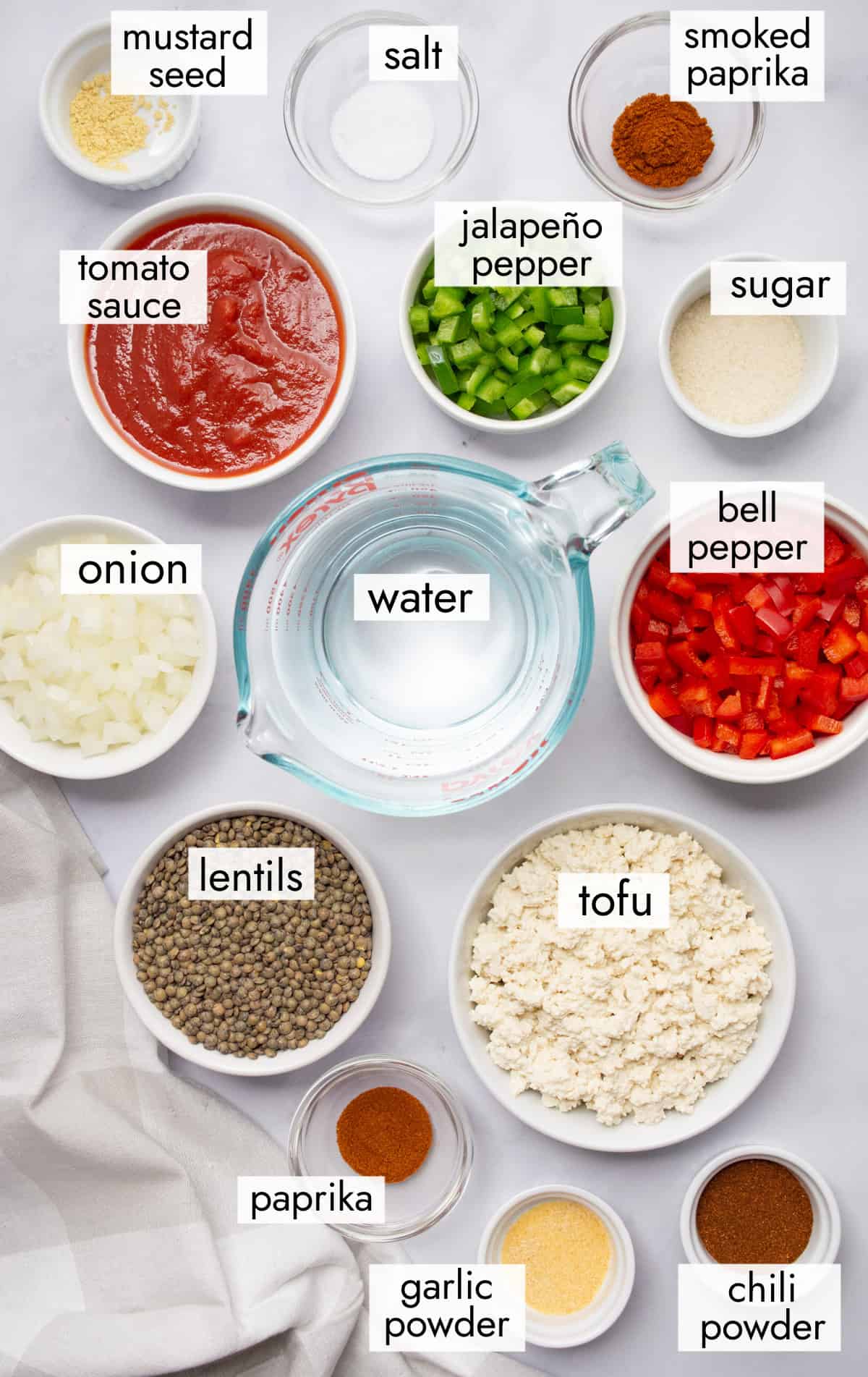 Ingredients in separate bowls for vegan sloppy joes.