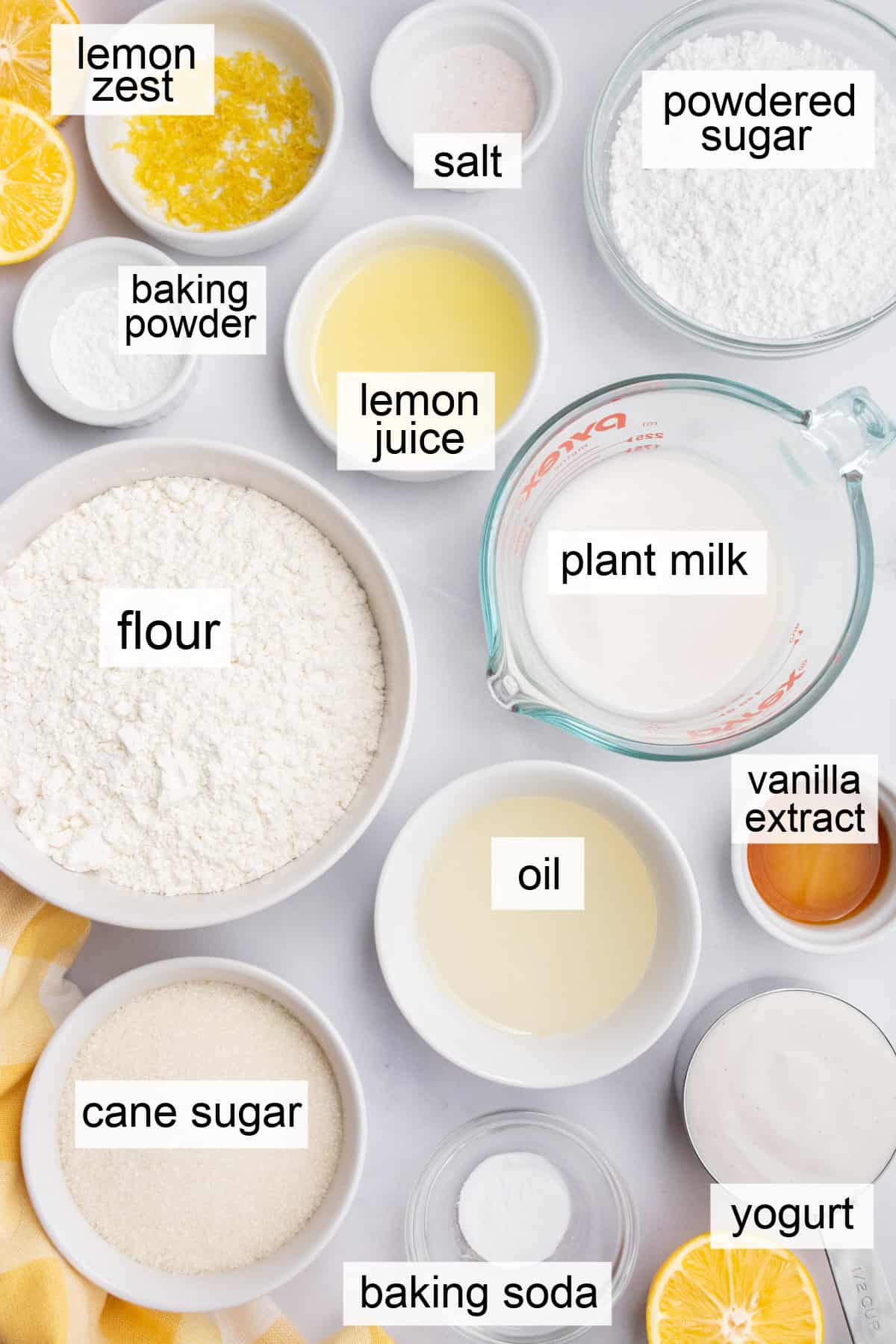 Bowls of ingredients to make vegan lemon loaf.