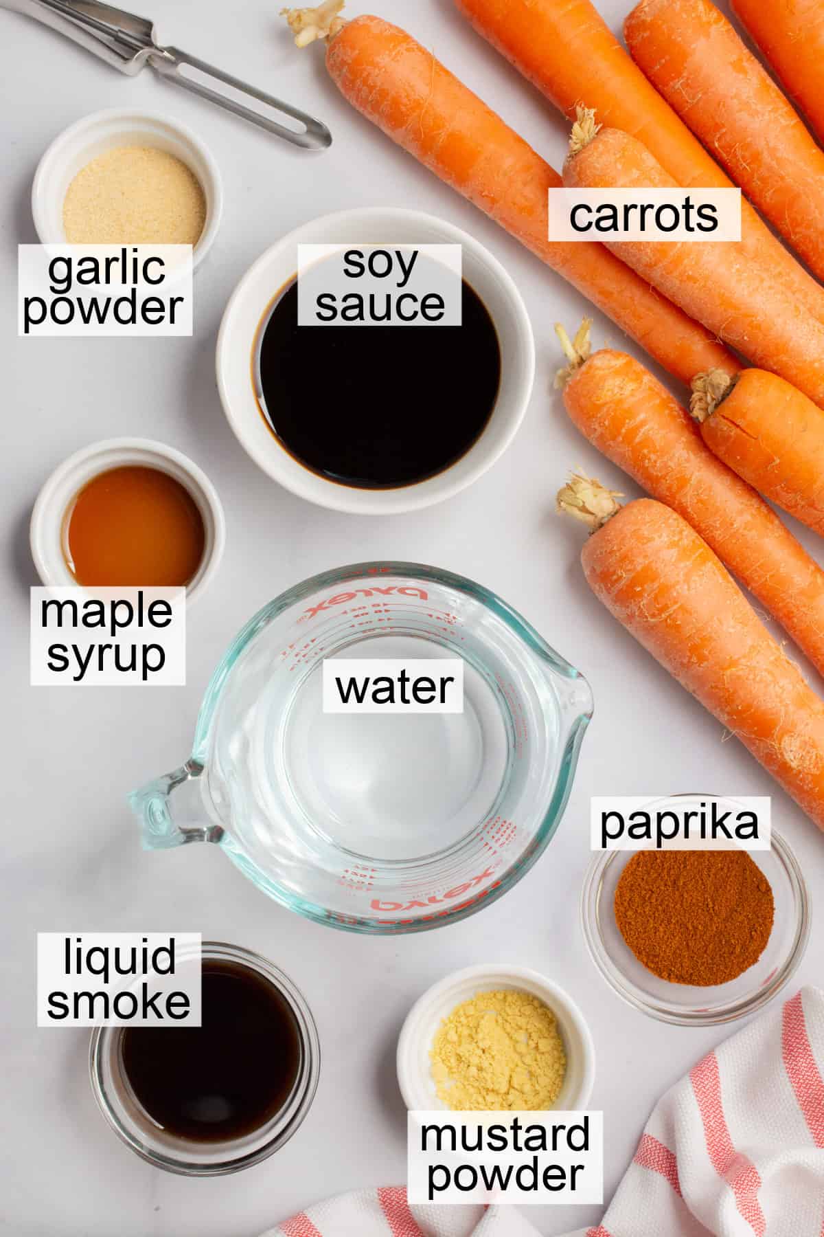 Bowls of ingredients to make vegan carrot hot dogs.