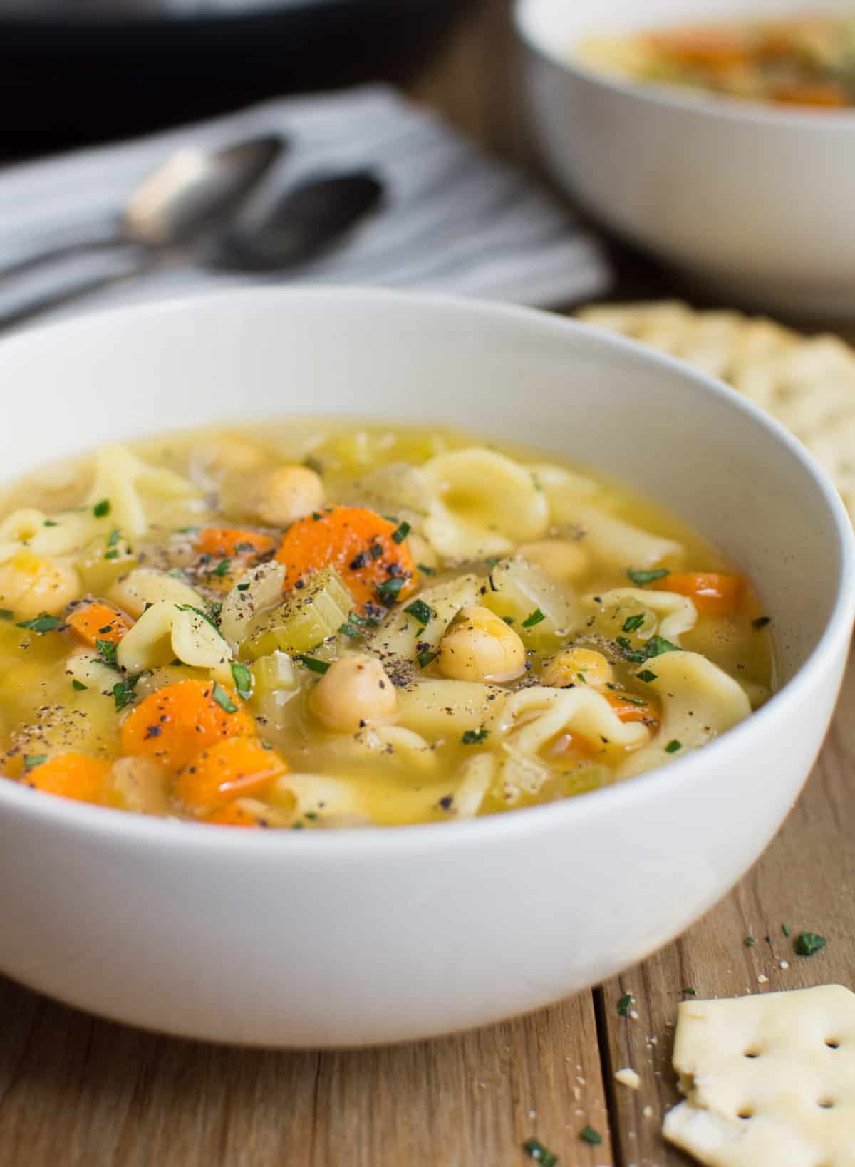 Vegan noodle soup in a white bowl.