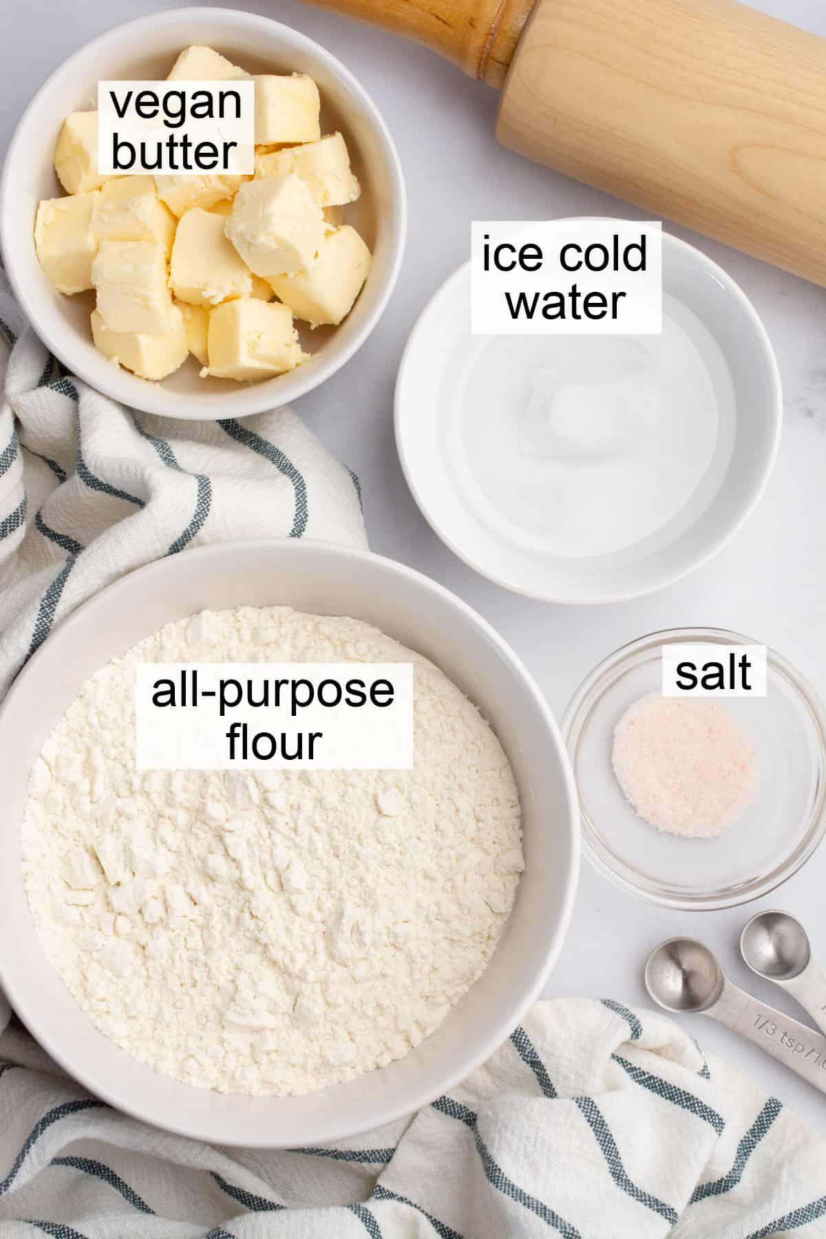 Ingredients in bowls to make vegan pie crust.