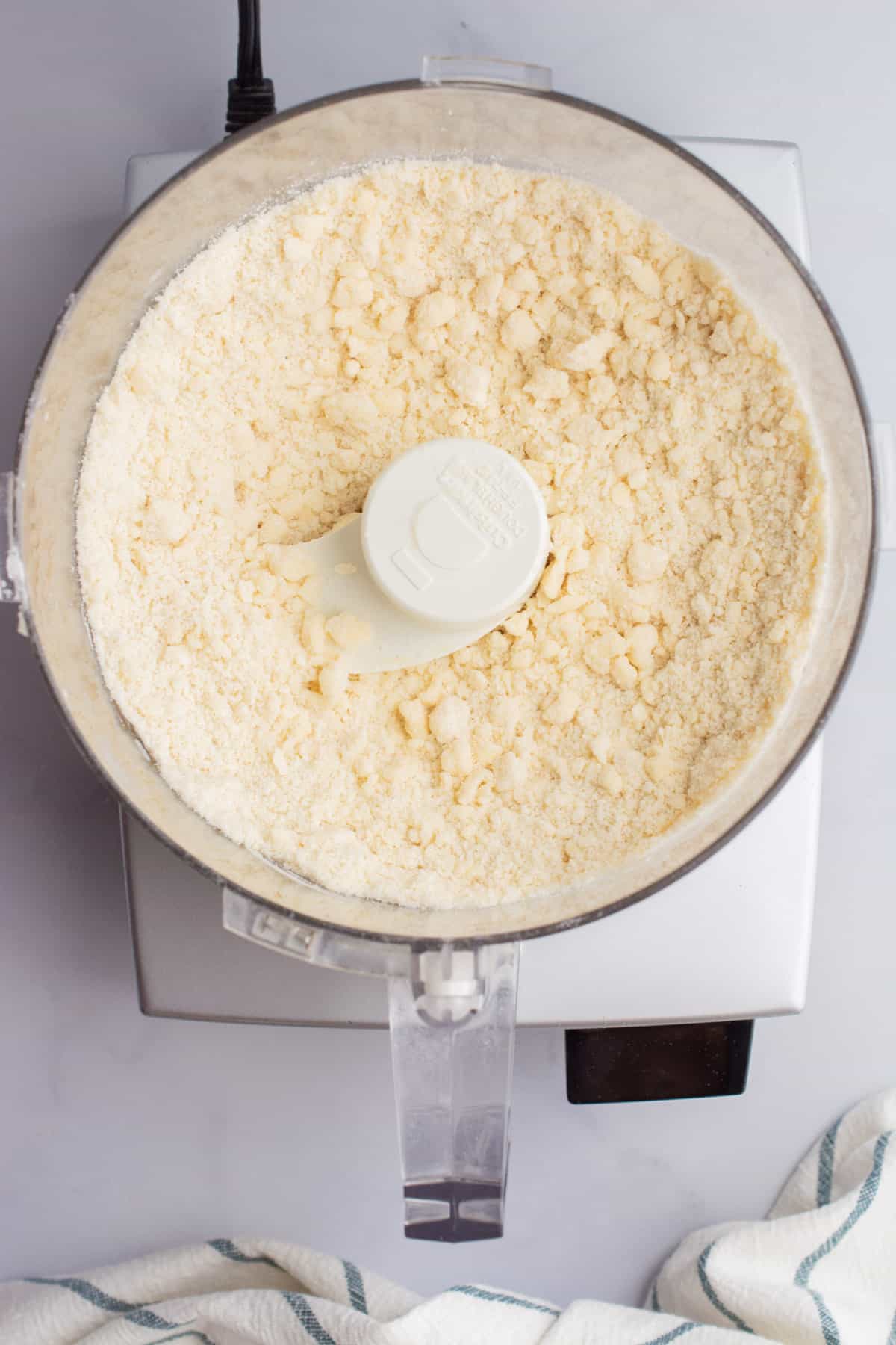 Flour, salt, and butter after pulsing in a food processor.