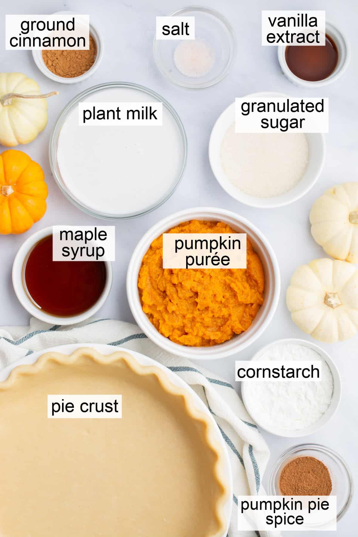 Bowls of ingredients to make vegan pumpkin pie.