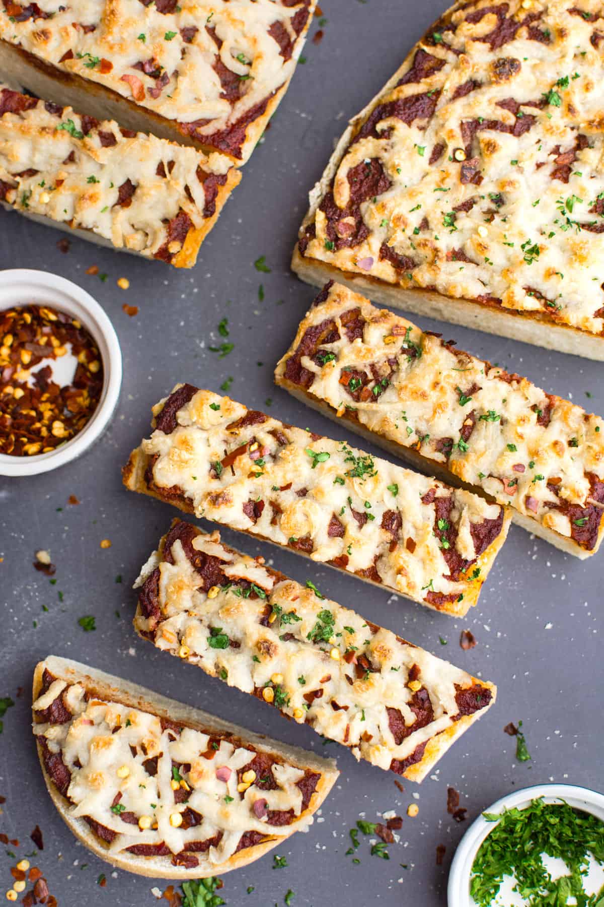 Vegan French bread cheese pizza cut into 2-inch slices.