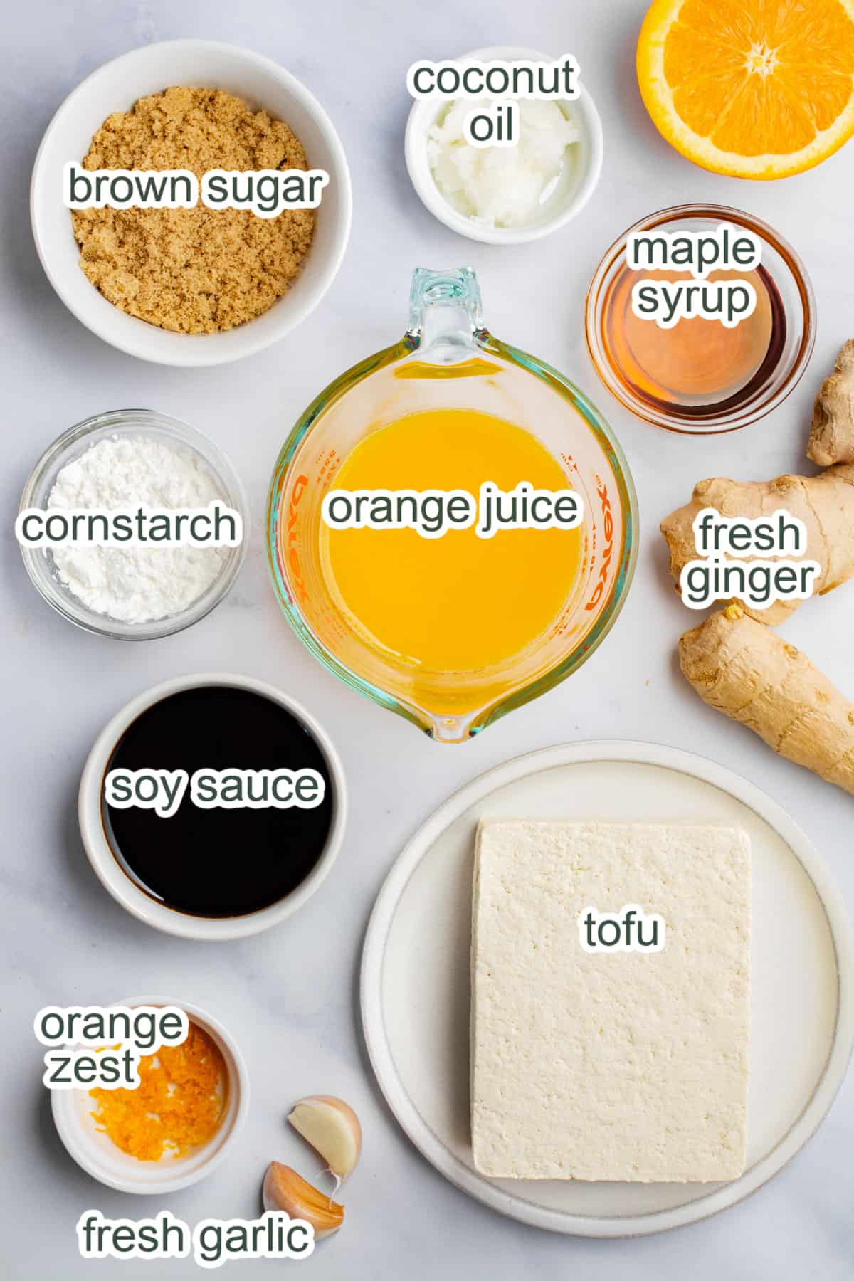 Ingredients in bowls to make vegan orange tofu.