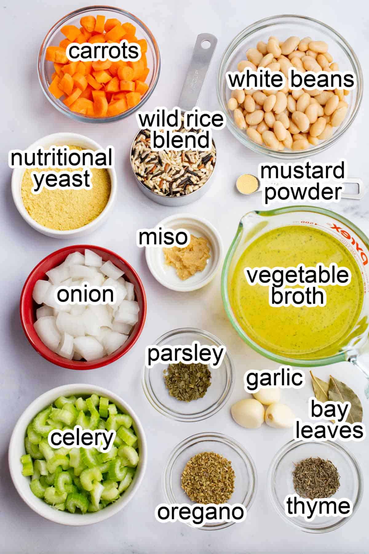 Bowls of ingredients to make wild rice soup.