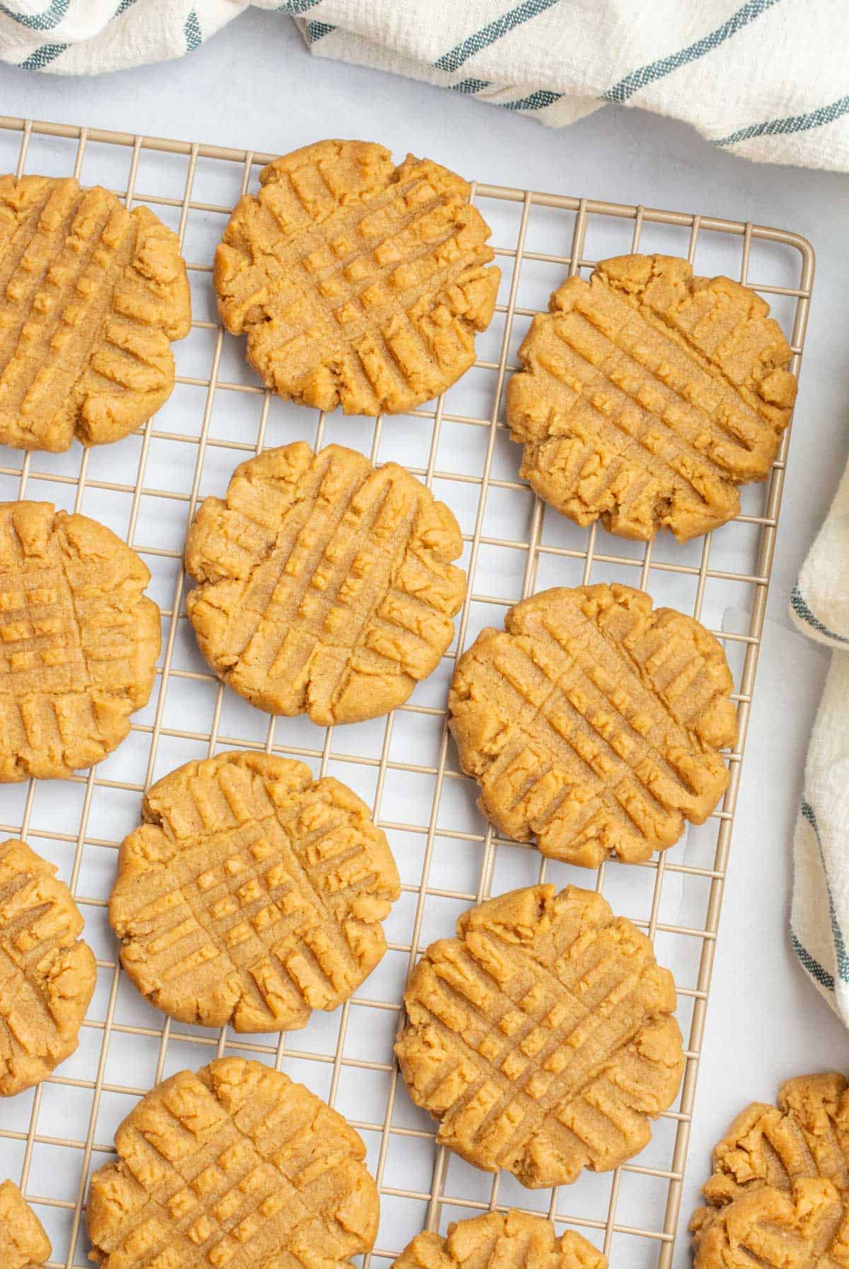 Vegan peanut butter cookies on a cooling rack.