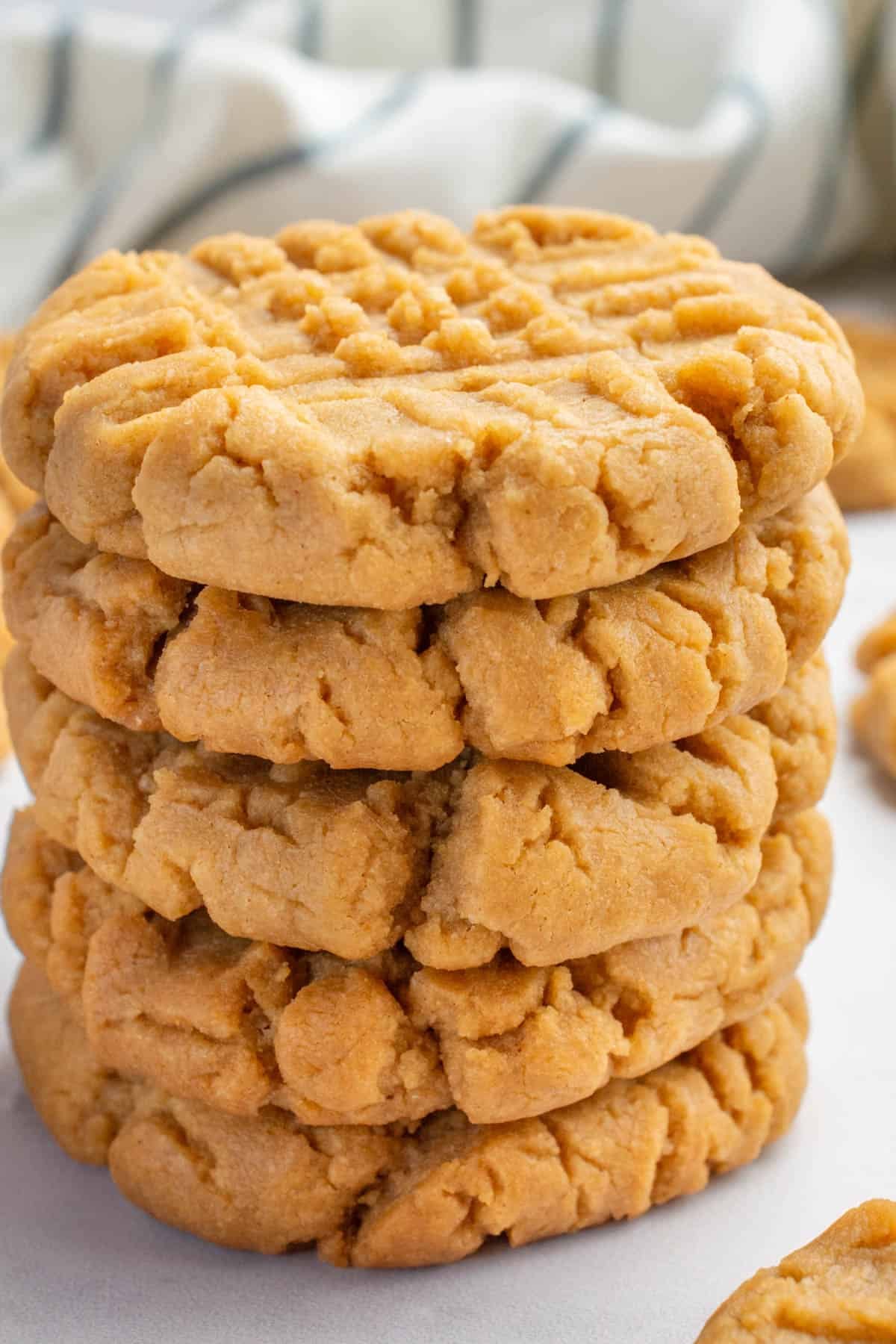 A stack of 5 vegan peanut butter cookies.